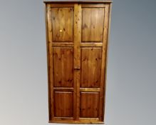 A pine double door wardrobe
