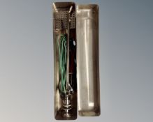 A vintage French medial instrument in a stainless steel box