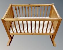 A pine rocking cot