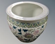 A Chinese style fish bowl planter