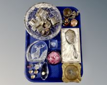 A tray of glass paperweights, cut glass bowl, decanter label,