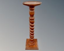 A barley twist torchere,