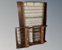 A pair of 20th century beech rail bed frames with spring bases.