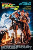 A collection of 12 movie posters to include: Back to the Future III, Transformers, The Lion King,