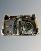 A collection of photographic equipment including Asahi Pentax SP 500 and two slide projectors.