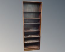 A set of mid-20th century Danish rosewood open bookshelves.