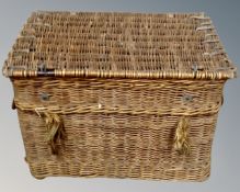 A vintage wicker laundry hamper.