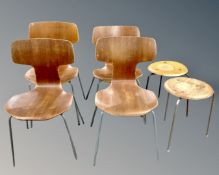 A set of four mid-20th century bent plywood dining chairs on metal legs together with two similar