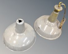 A pair of vintage grey enamelled industrial pendant light fittings.