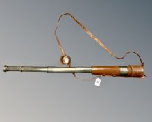 An early 20th century brass and leather bound four drawer telescope by Broadhurst Clarkson & Co.