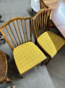 A set of six 20th century beech railback dining chairs.