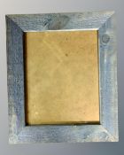 One crate containing twenty six 20 cm x 25 cm blue wood photo frames, all brand new.