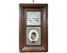 A 19th century American wall clock.