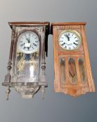 A Polaris wall clock together with a further 31 day wall clock.