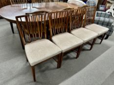 A set of four 20th century beech railback dining chairs.