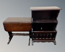 An oak magazine occasional table fitted with a shelf together with a further flap sided occasional