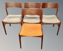 A set of four mid-20th century Danish teak dining chairs.
