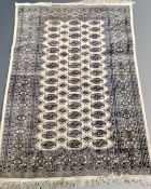 A Lahore Bokhara rug, Pakistan, on cream ground, 188cm by 125cm.