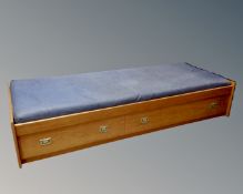 A 20th century Scandinavian 3' bedframe with interior and drawers beneath.