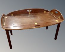 A mahogany butler's tray on stand.