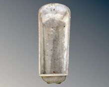 A vintage galvanized bath.