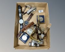 A collection of wristwatches together with coins including 1975 Olympic $10 coin etc.