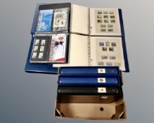 Six stamp albums containing Jersey, Guernsey and Alderney stamps.