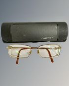 A pair of Cartier spectacles in original box.