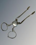 An antique 18th century pair of Georgian sugar scissors, indistinct marks.