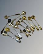 A collection of 15 silver salt and mustard spoons, Georgian and Victorian examples.