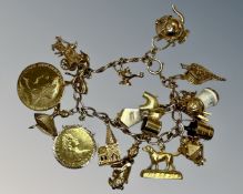 A 9ct gold charm bracelet, 69.6g.