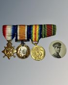 First and Second World War miniatures on ribbon.