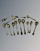 A collection of 14 silver salt spoons.