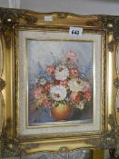 An oil on canvas still life in gilt frame. (Collect only)