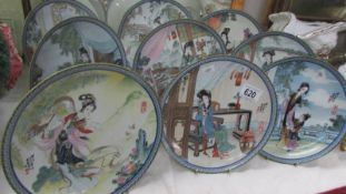 Six Japanese Geisha plates.