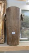 A tall wooden vase with handles. (Collect only)