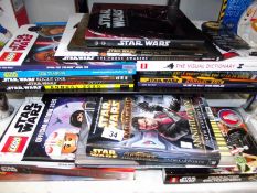 A selection of children's Star Wars books including Lego annuals, figures present in 2 of the