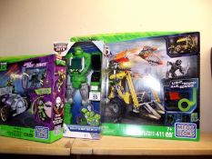2 sealed teenage Mutant Ninja Turtles mega blocks sets and a Transformers rescue bots COLLECT ONLY