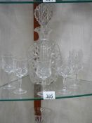 A good quality mid 20C oval cut glass decanter and six glasses. COLLECT ONLY.