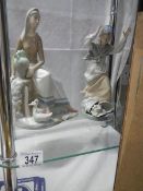 Two Spanish Lladro style figures.