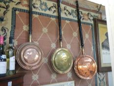 Three Victorian copper warming pans. COLLECT ONLY.