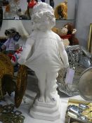 A plaster statue of a young girl. COLLECT ONLY.