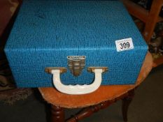 A blue mid 20th-century case.