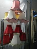 A mixed lot of wall light shades.