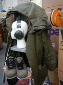 A Tweed jacket and trousers, a pair of Timberlake shoes and a set of head phones.