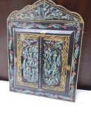 A hand painted two door wall mirror. COLLECT ONLY.