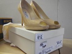 A pair of Jimmy Choo, London shoes.