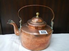 An early 20th century copper kettle.