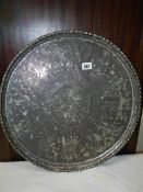 A large silver plate on copper Indian tray (plate badly worn). COLLECT ONLY.