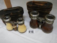 Two cased pairs of opera glasses.